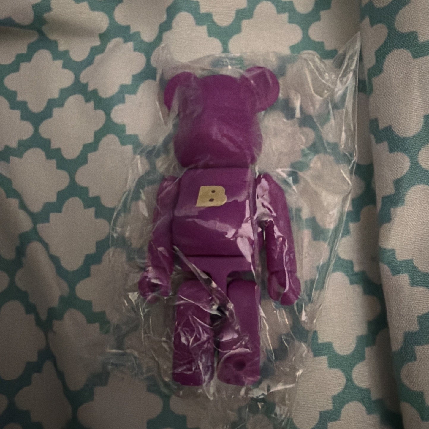 Purple Bearbrick with letter B
