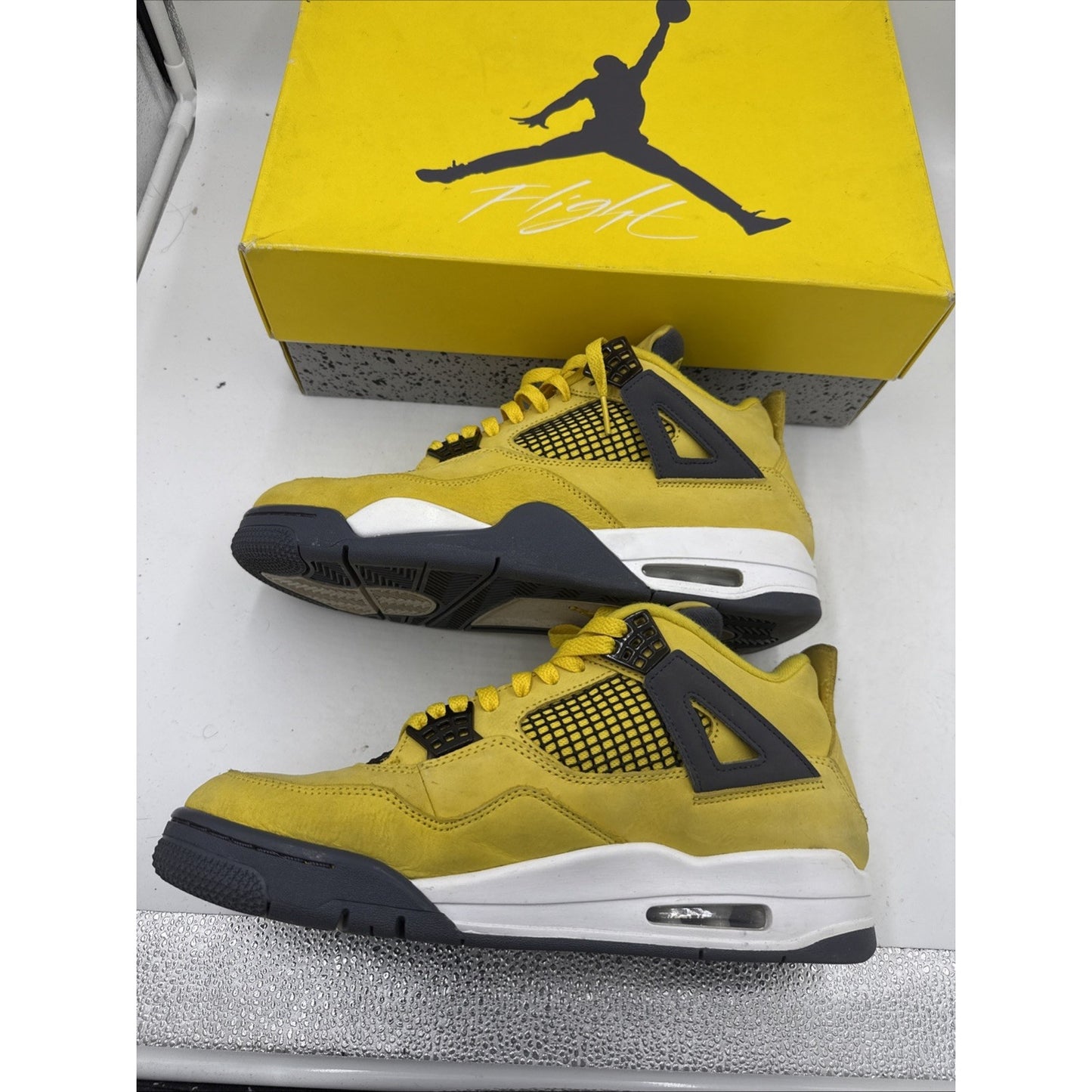 Size 10 - Jordan 4 Retro Mid Lightning