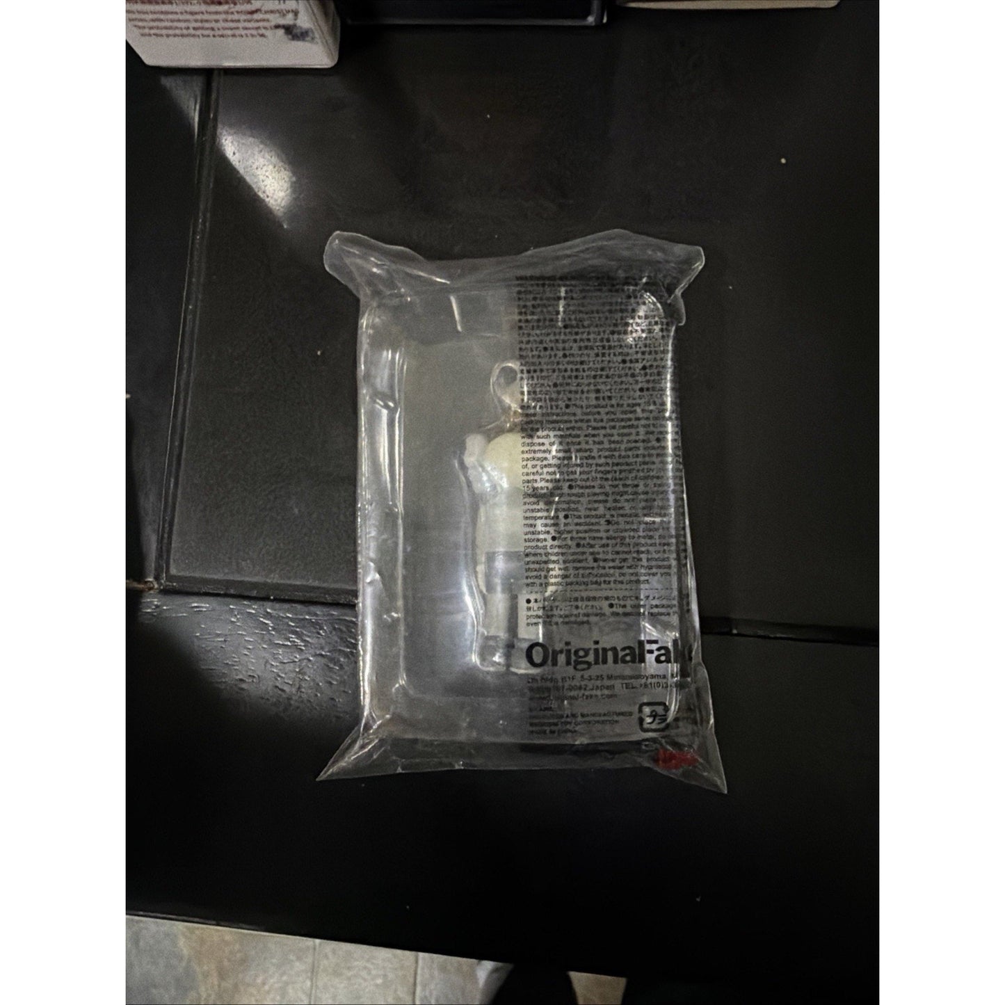 OriginalFake KAWS Keychain Companion Brown 2009