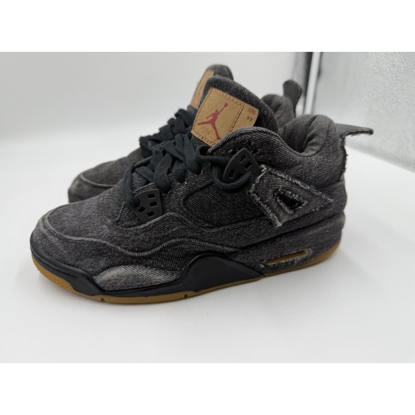 Size 6.5y Jordan 4 Retro Levi’s Black AQ9103-001